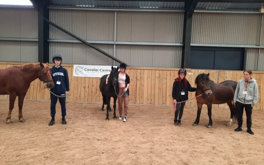 Image of 3 horses and their riders