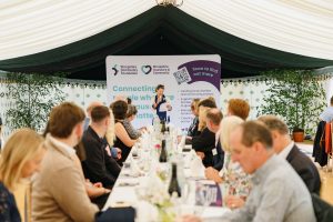 (SCF Chair of Trustees, Selina Graham addresses guests and members)